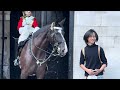 SILLY IDIOT TOURIST GRABS THE REINS AND THE KING'S GUARD DID THIS at Horse Guards!