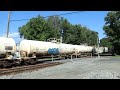 CSX L002, nearly 500 axles long, thunders through Ashland MA, westbound to Worcester on 9/7/23