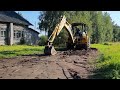 Komatsu WB93S в работе.