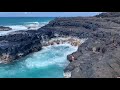 Kid swimming to survive scary wave Queen's Bath Kauai, Hawaii