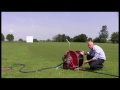 Travelling sprinkler for watering sports pitches