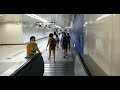 Coming down the escalators from Taipei 101