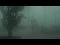 The sound of thunder, - 2 hours of video of raindrops flowing on the window of a bus stop