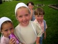 Amish girls who are playing in Shipshewana, Indiana, USA