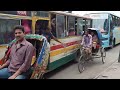 Dhaka city bus helper calling for passenger