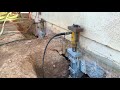 Lifting a home's foundation with Push Piers