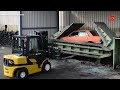 The Fate of End-of-Life Vehicle. Car Recycling Process. Car Crush Machine and Steel Shear