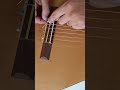 Como colocar corda de nylon sem bolinha no violão