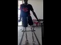 Tanzanian boy  has gait training at Lake Victoria Disability Centre