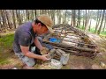 Camping alone building underground survival shelter. BUSHCRAFT. CAMPING IN THE RAIN