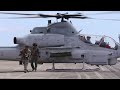 USMC UH 1Y Huey Attack Helicopter Conducts Air to Ground Fire