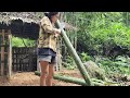 A 15-year-old girl living in the forest makes a bed out of bamboo as a temporary resting place.