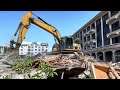Excavator at demolition site