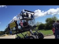 Riding in a giant grocery cart