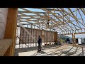 Helping the neighbors put up roof trusses.