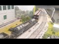 2 Penn Central Freight trains running around the layout in HO Scale