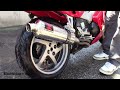 Aftermarket Cat back exhaust installation d'un échappement moto.