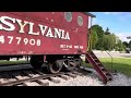 Showing off a railroad caboose in Roaring Spring Pa