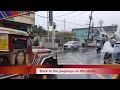 A WALK IN HEAVY RAIN ALONG THE PASIG RIVER IN MANILA