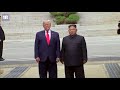 Moment Trump steps into North Korea to meet Kim Jong-un