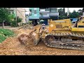 New project! Well done Dozer Komatsu D37P in action pushing soil