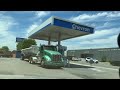 At a gas station in Los Angeles. Pumping & washing front windshield. Timelapse of clouds!