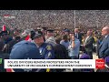 BREAKING: Police Officers Remove Protesters From The University Of Michigan’s Commencement Ceremony