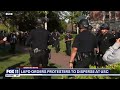 Police begin charging towards pro-Palestine protesters' direction at USC