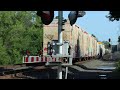 CSX M367, nearly 500 axles long, rumbles westbound through Voorheesville, NY on 7/20/23