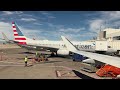 American Eagle landing at Denver international Airport in 4K