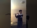 exyl playing ping 2 on his flute