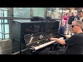 Cool person plays the piano in London