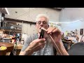 Demonstration of how to radius fret wire by hand.