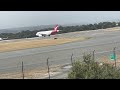 A Qantaslink A319 taxiing to runway 03 and taking off