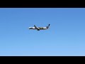 Air New Zealand 777-300er (hobbit livery) takeoff from Brisbane