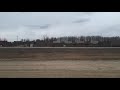 CN trains at Controlled crossing lights/ arms off hywy 16 at Gainford, Alberta