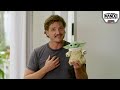 Pedro Pascal with Grogu toy