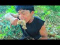 Survival in the rainforest- Man smart dog shoot duck by bamboo bow and eat duck -Eating