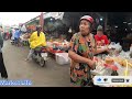 Cambodian street food - Roasted Pigs, Roasted Duck, fruit, cakes & more Chinese New Year
