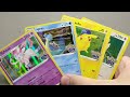 Budget Pokemon Card collecting unboxing PoGo PLUS Evolving Skies Blisters! Radiant Charizard???