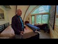 No bank loaned them money. They built dream Hobbit Home themselves