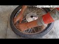 motorcycle wheel balancing dent remove process