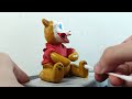 Crafting a Joker-Inspired Pooh Bear Sculpture: Adorable meets Sinister!
