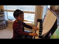 Barron Playing Piano