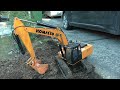 RC excavator digging action