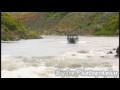 Jet boat hits rock on the way down.