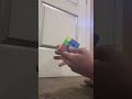 solving a rubix cube (she twised a coner)