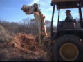 JW Long, Inc._JD BACKHOE FILL DIRT.wmv