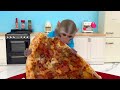 Monkey Baby Bon Bon eat giant pizza in the garden and harvest watermelons with ducklings