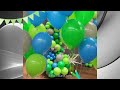 Balloons garland arch with mix shades of latex balloons ( Lime green, Robinegg Blue, Gray & Silver )